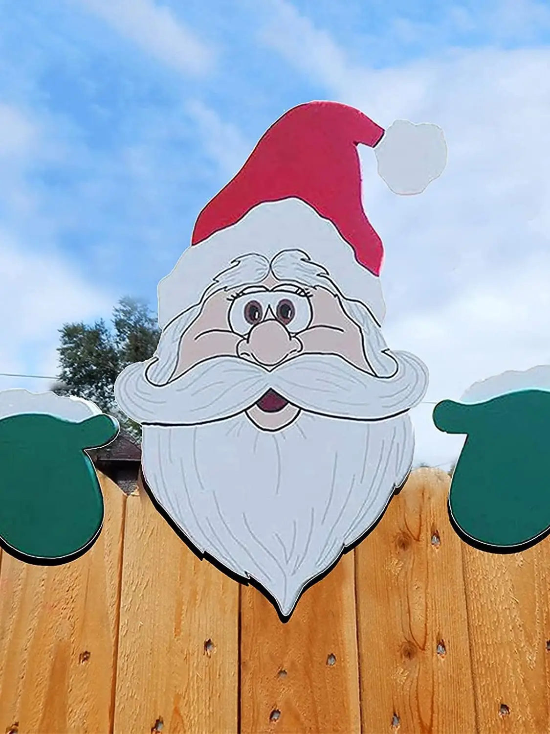 Christmas decoration with Santa Claus window peepers