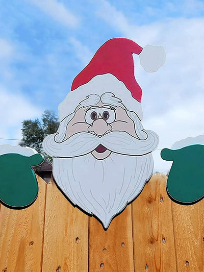 Christmas decoration with Santa Claus window peepers