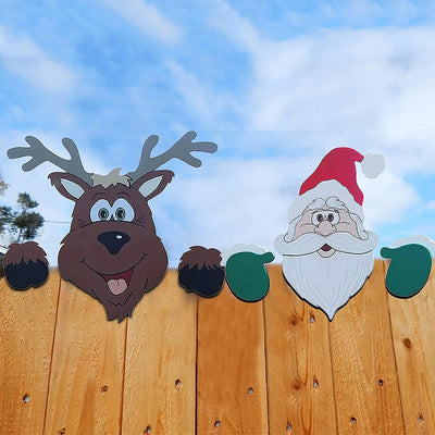 Christmas decoration with Santa Claus window peepers